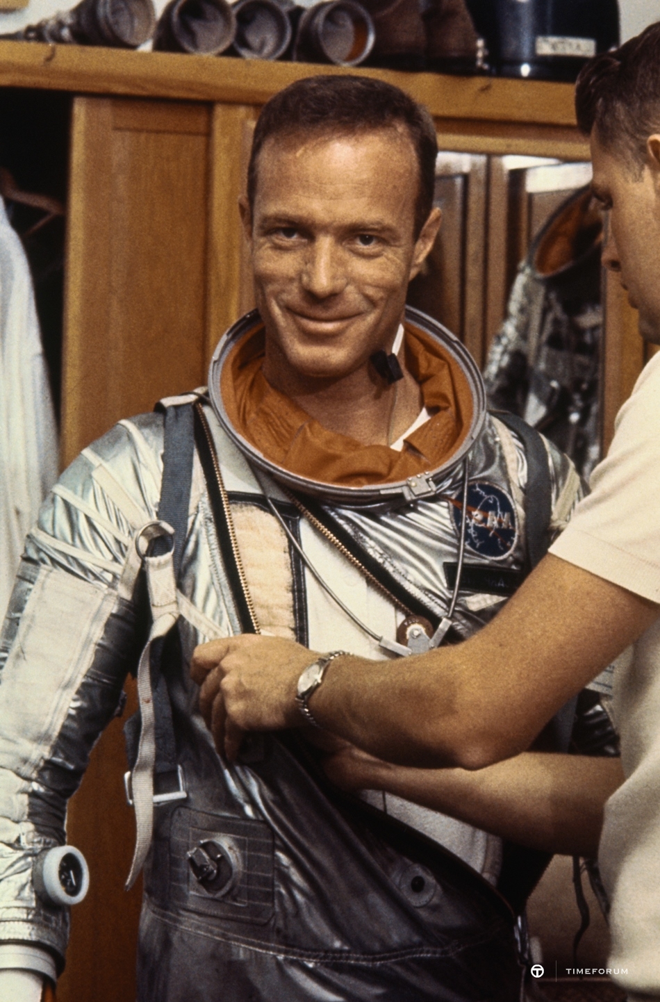 05_Scott Carpenter dons the Project Mercury suit he will wear on his MA-7 orbital flight. @GettyImages.jpg