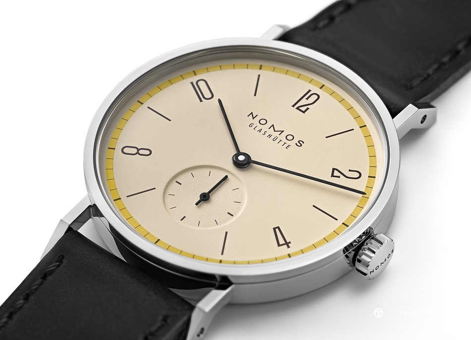 12_NOMOS_Tangente_yellow_lying.jpg