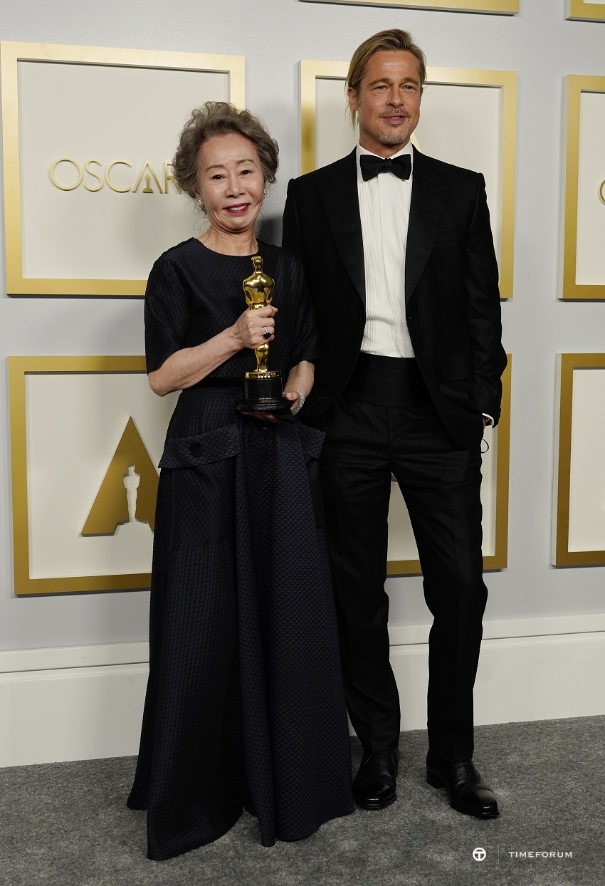 Oscar Winner Yuh-Jung Youn in Chopard with Brad Pitt.jpg
